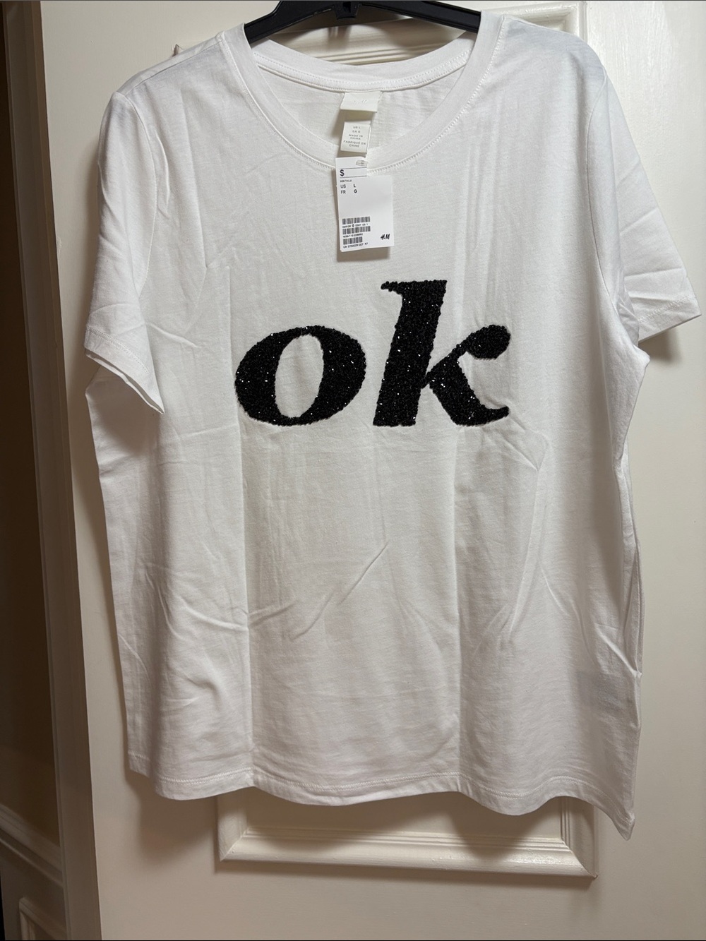 H&M White Tee with Black 'ok' Sequin Graphic